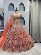 "ROYAL CORAL AND ROSE GOLD LEHENGA" image 1