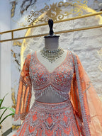 "PEACH ROYALE HEAVY EMBROIDERED LEHENGA" image 1