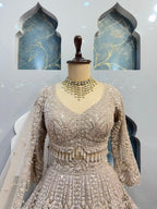 "CHAMPAGNE ROYALE HEAVILY EMBELLISHED LEHENGA" image 1