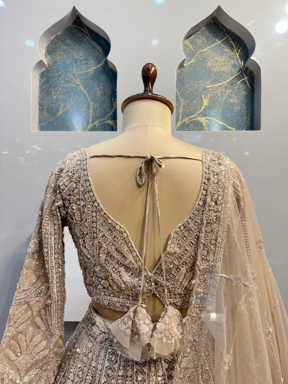 "CHAMPAGNE ROYALE HEAVILY EMBELLISHED LEHENGA" image 4