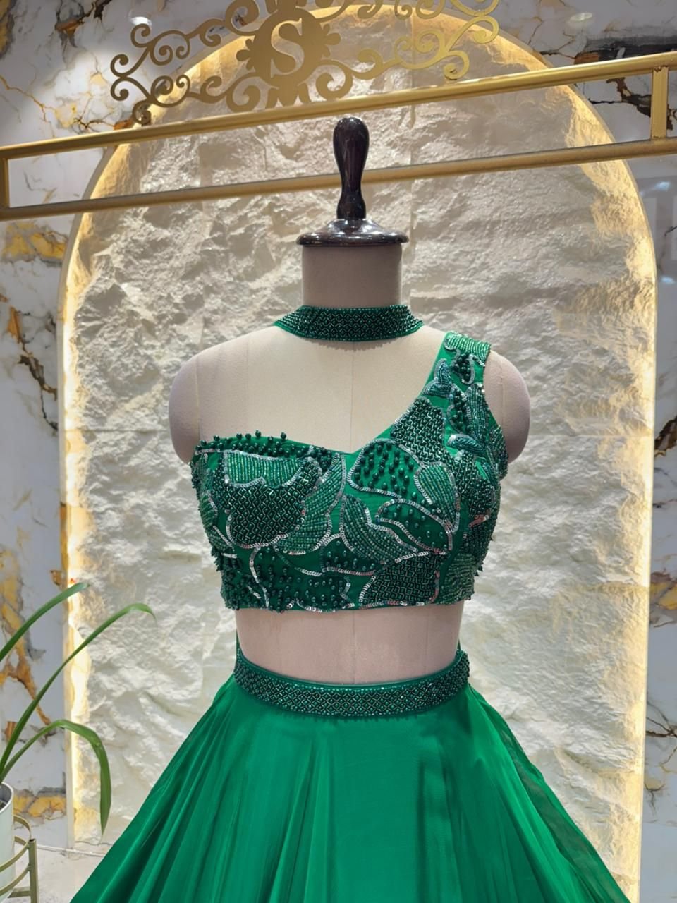 "EMERALD ELEGANCE ONE SHOULDER LEHENGA" image 1