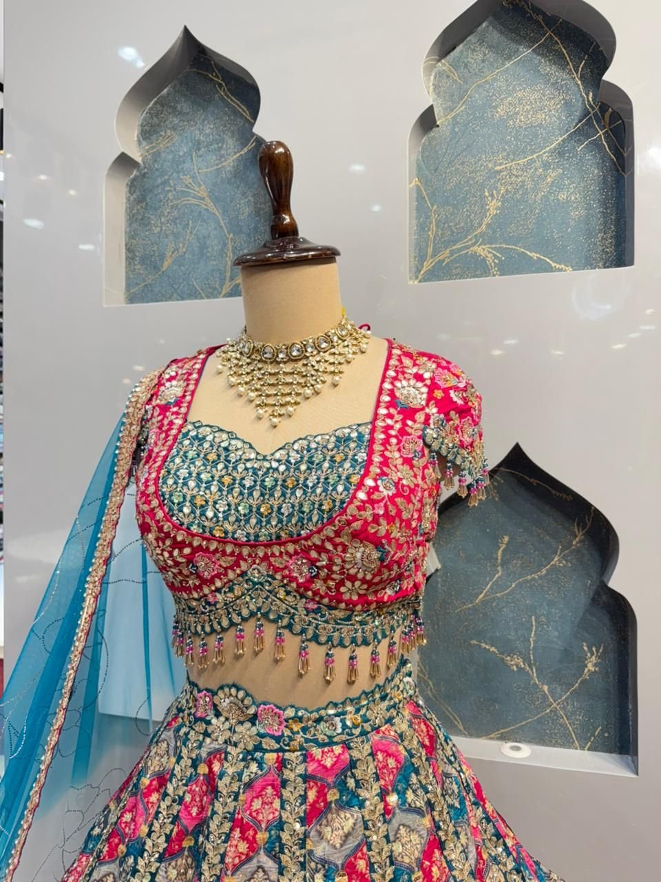 "ROYAL FUCHSIA AND TURQUOISE LEHENGA" image 2