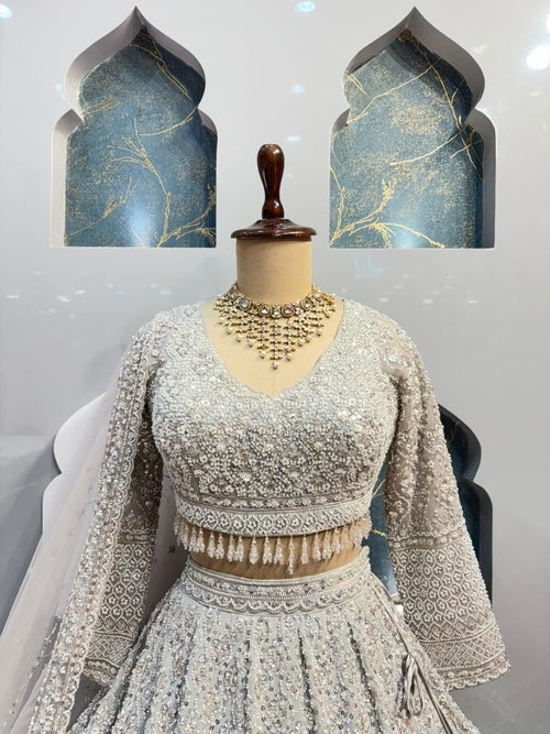 "IVORY ROYALE BRIDAL LEHENGA" image 1
