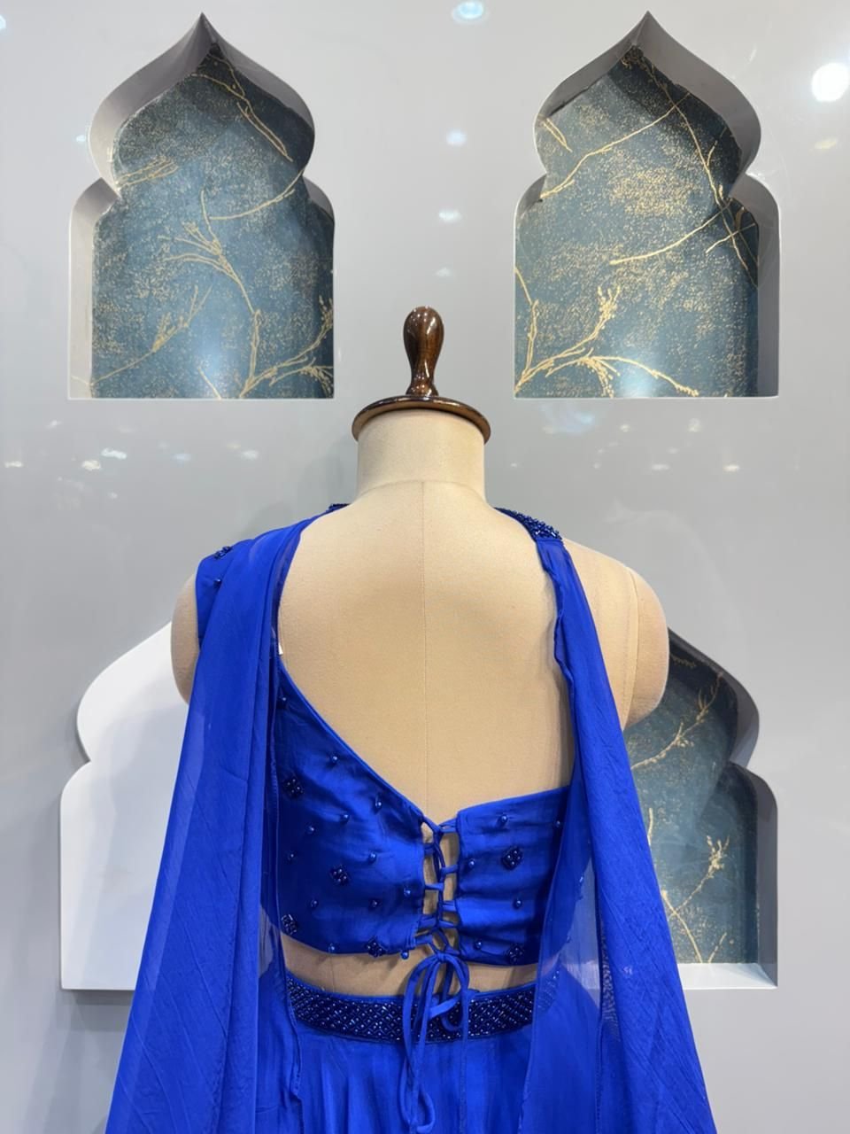 "MIDNIGHT SAPPHIRE ONE- SHOULDER LEHENGA" image 5