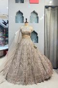 "IVORY GOLD MIRAGE LEHENGA" image 0