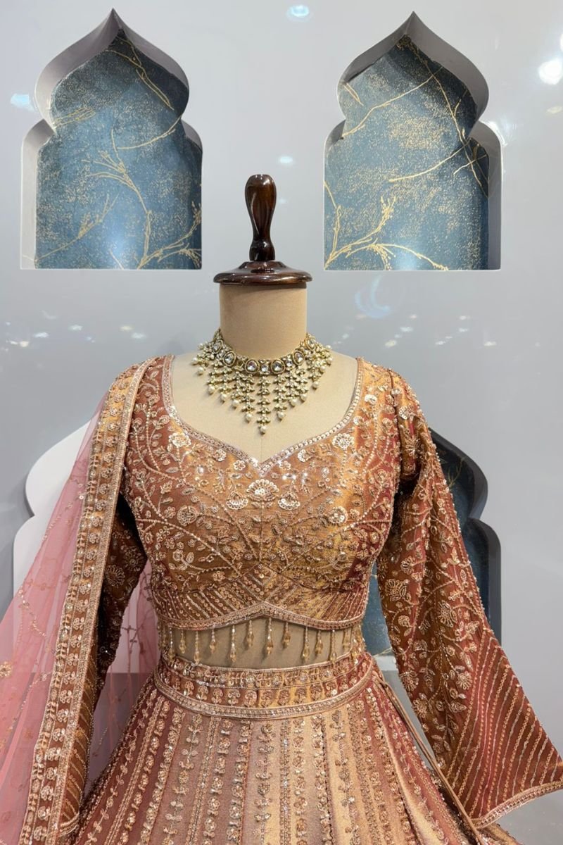 "REGAL ROSE GOLD PEACOCK LEHENGA" image 1