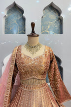 "REGAL ROSE GOLD PEACOCK LEHENGA" image 1