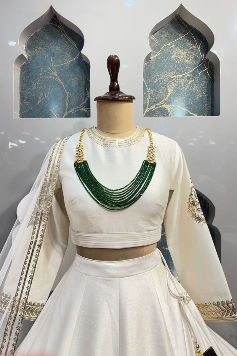 "IVORY ROYALE EMBROIDERED LEHENGA" image 1