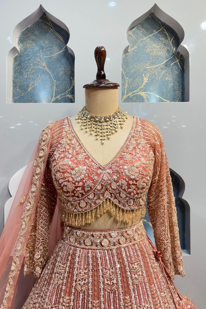 "BLUSH ROSE GOLD HEAVILY EMBROIDERED LEHENGA" image 1