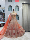 "ROYAL CORAL AND ROSE GOLD LEHENGA" image 0