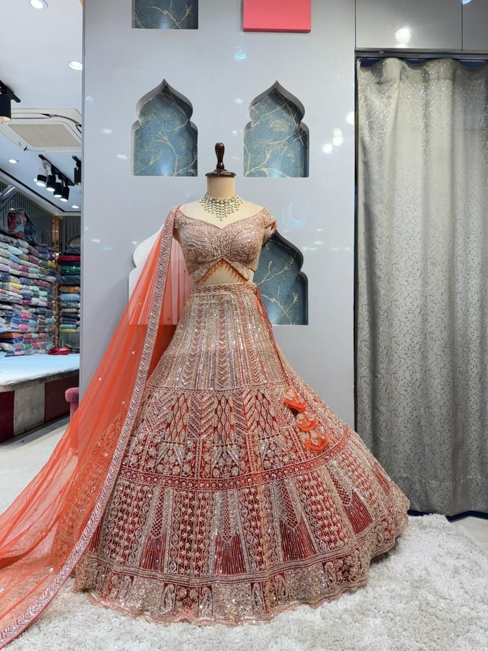 "ROYAL CORAL AND ROSE GOLD LEHENGA" image 0