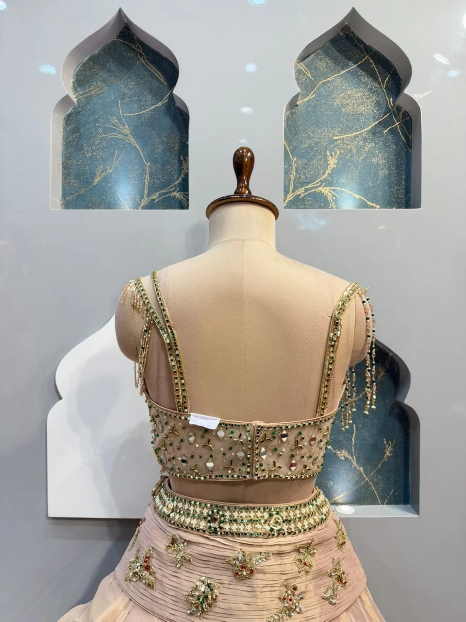 "BLUSH PINK EMERALD EMBELLISHED LEHENGA"