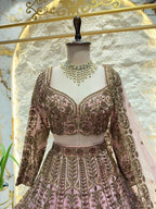 "BLUSH PINK AND ANTIQUE GOLD ROYAL LEHENGA"