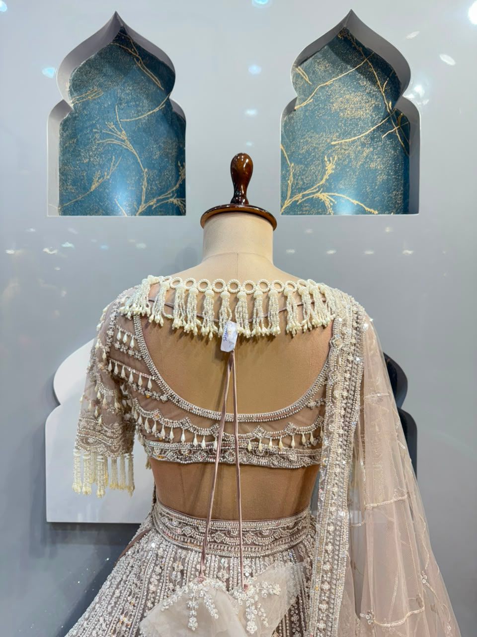"IVORY ROYALE TASSEL LEHENGA"