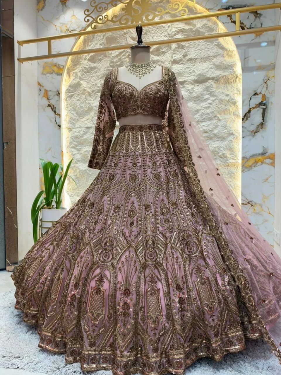 "BLUSH PINK AND ANTIQUE GOLD ROYAL LEHENGA"