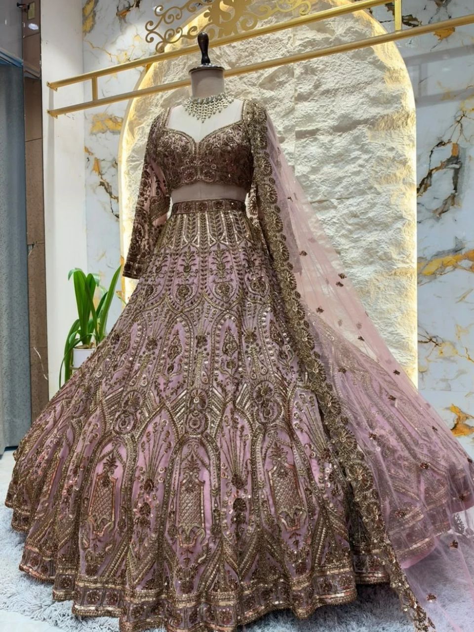 "BLUSH PINK AND ANTIQUE GOLD ROYAL LEHENGA"