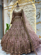 "BLUSH PINK AND ANTIQUE GOLD ROYAL LEHENGA"