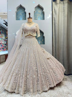 "IVORY ROYALE TASSEL LEHENGA"