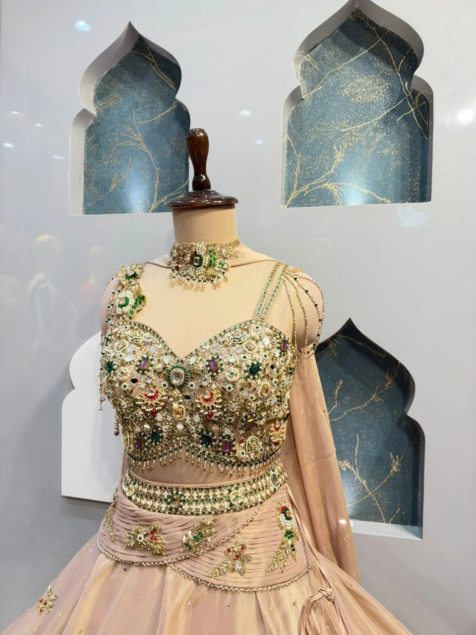 "BLUSH PINK EMERALD EMBELLISHED LEHENGA"