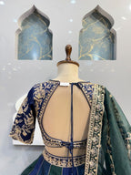 "REGAL BLUE AND EMERALD GREEN LEHENGA"