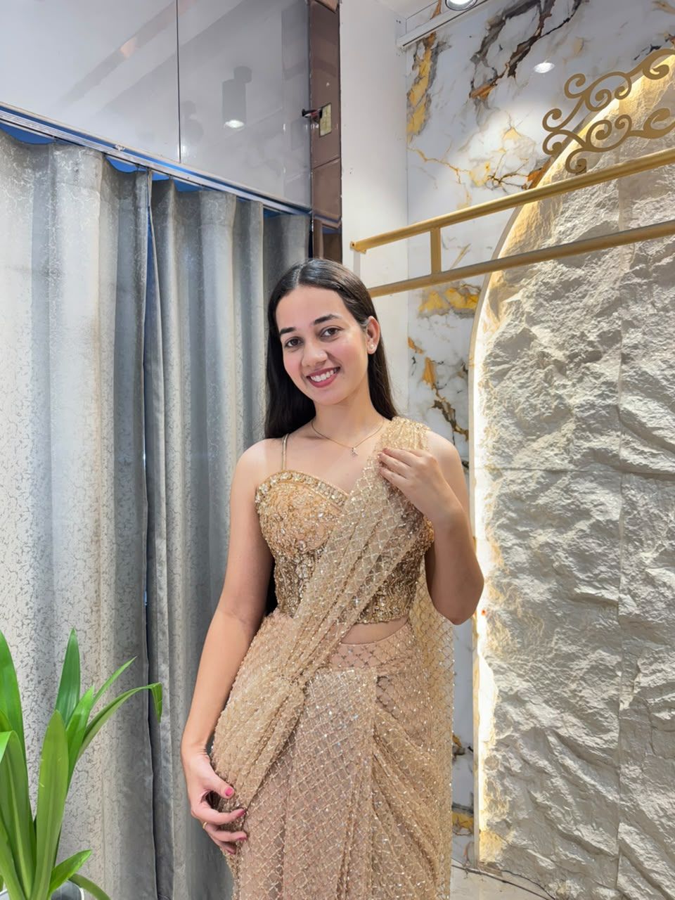 " CHAMPAGNE GLOW DRAPE SAREE"
