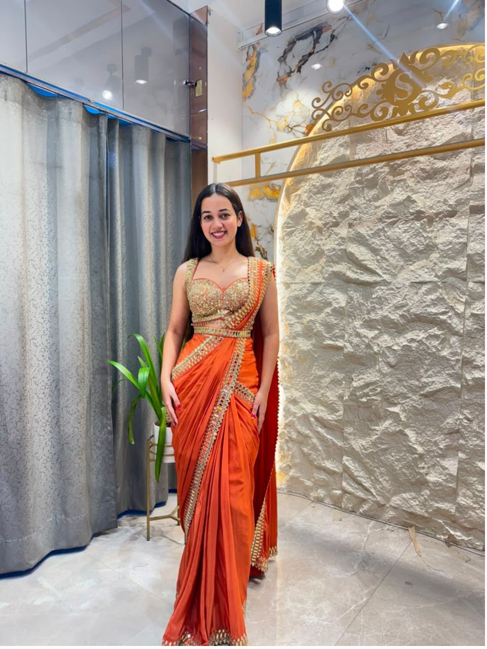 "SUNSET ORANGE ROYALE DRAPE SAREE"