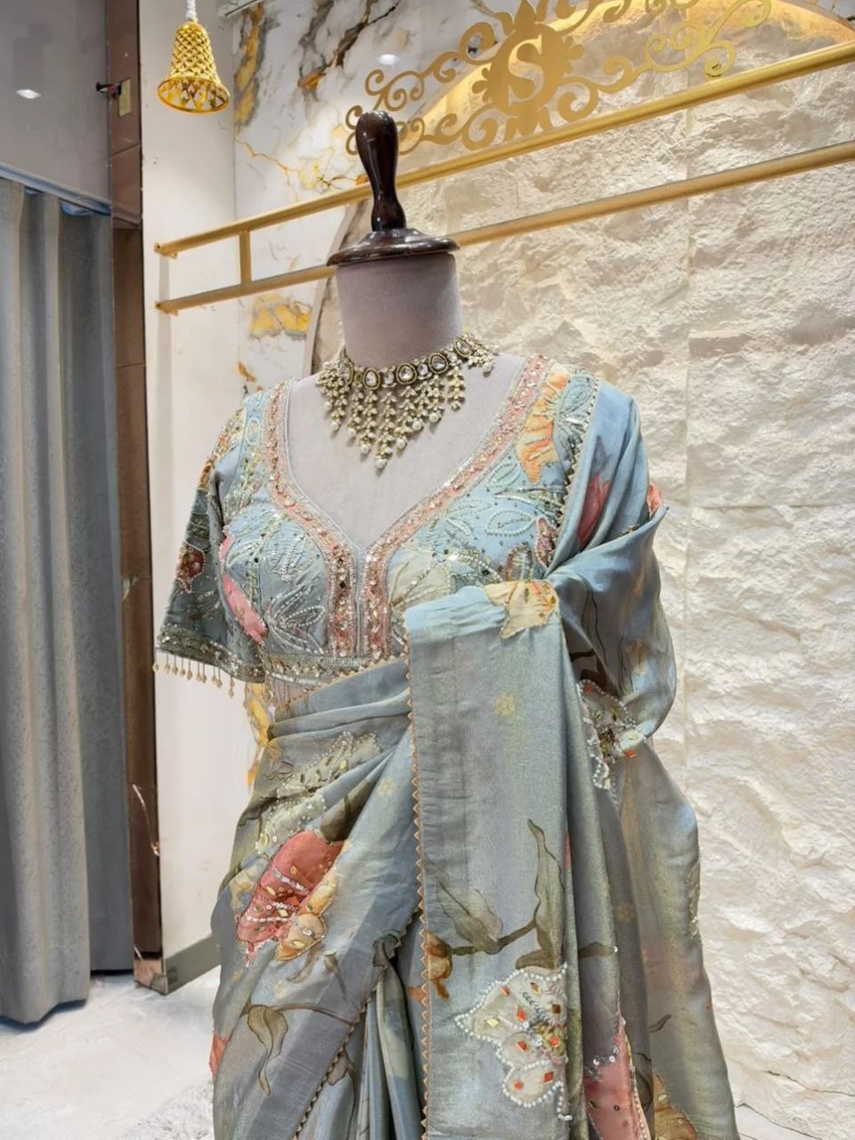 "PASTEL BLUE FLORAL EMBROIDERED SAREE"