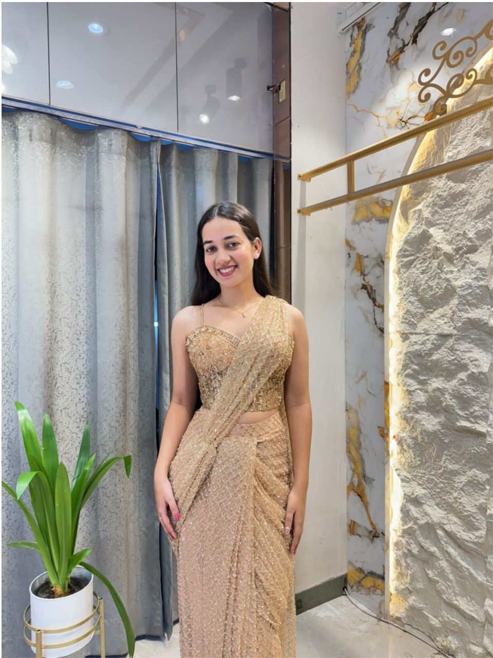 " CHAMPAGNE GLOW DRAPE SAREE"