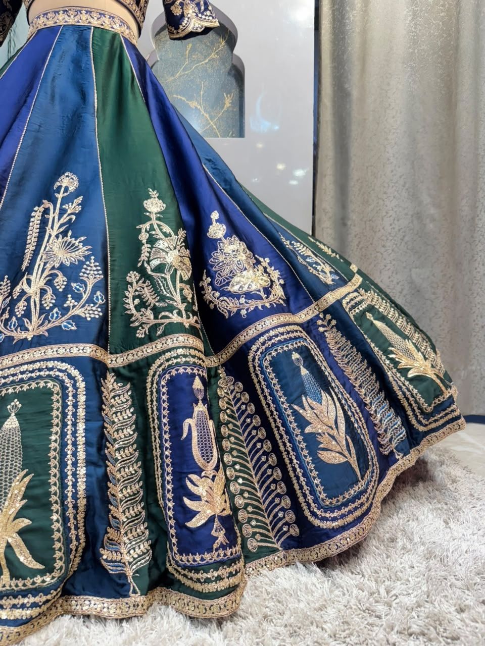 "REGAL BLUE AND EMERALD GREEN LEHENGA"