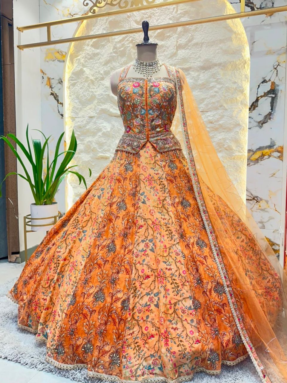 "AMBER BLOSSOM  COUTURE LEHENGA"