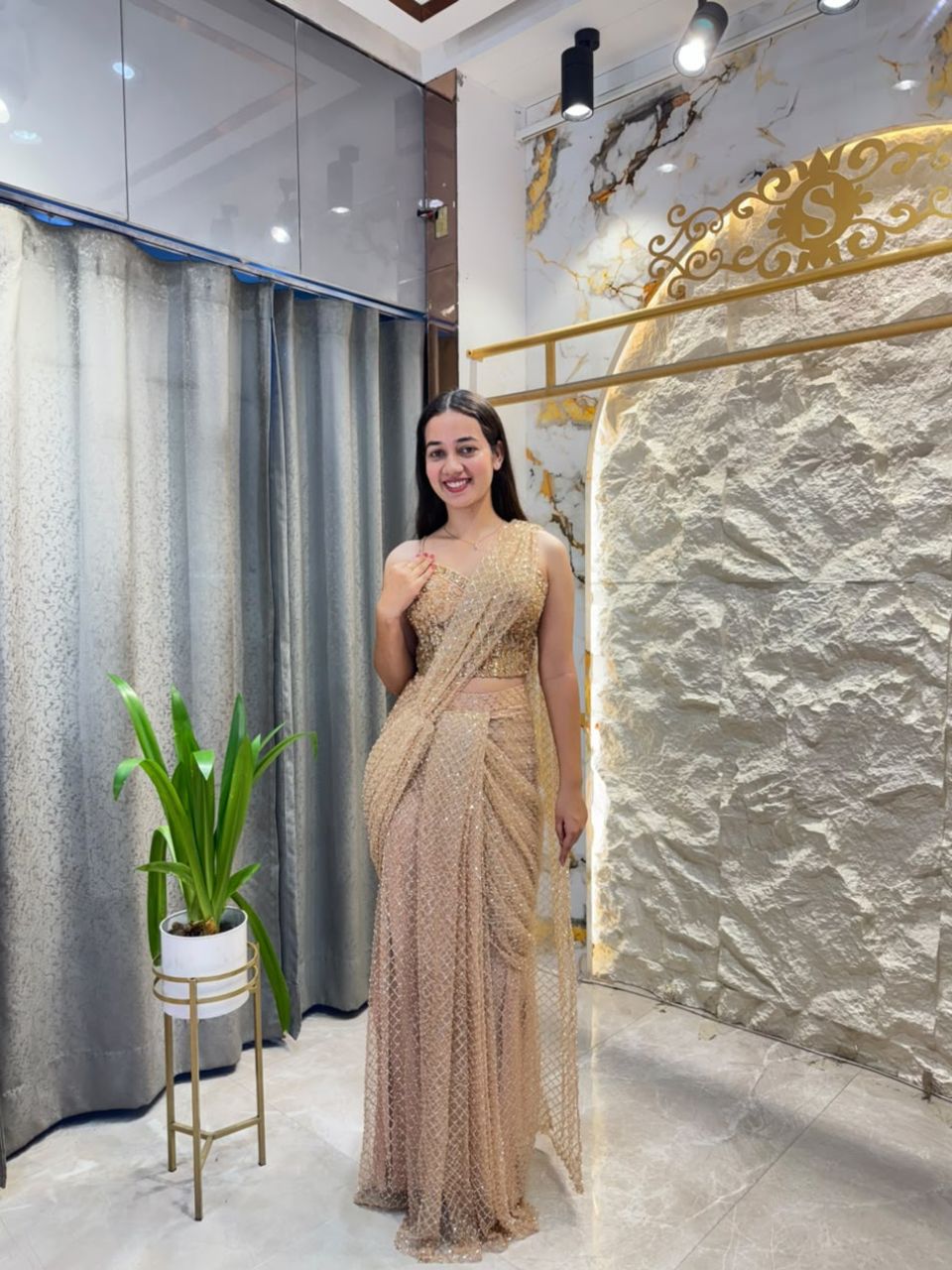 " CHAMPAGNE GLOW DRAPE SAREE"