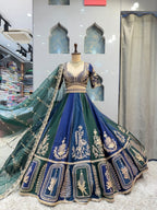 "REGAL BLUE AND EMERALD GREEN LEHENGA"