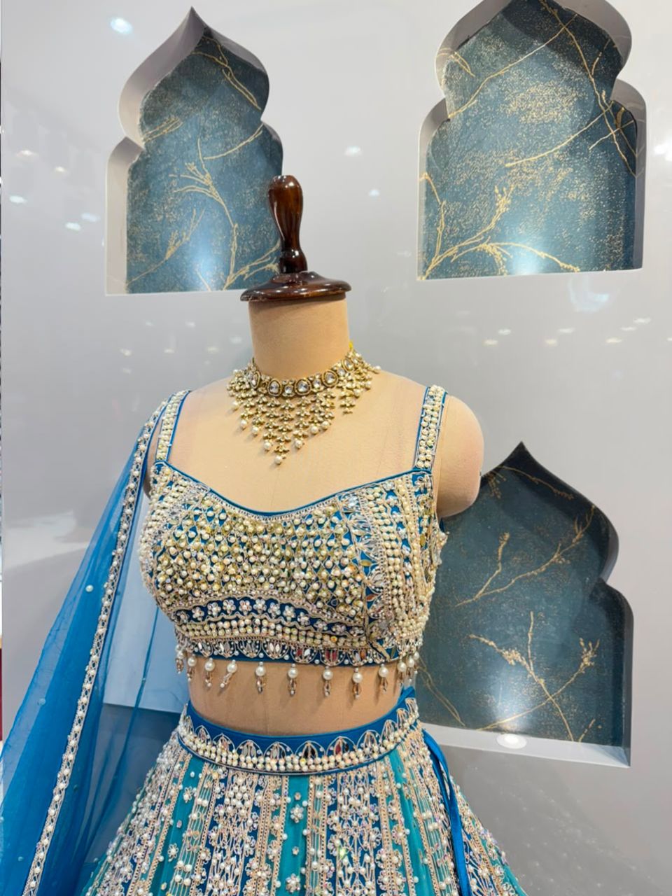 "AQUA BLUE AND SILVER EMBROIDERED LEHENGA"