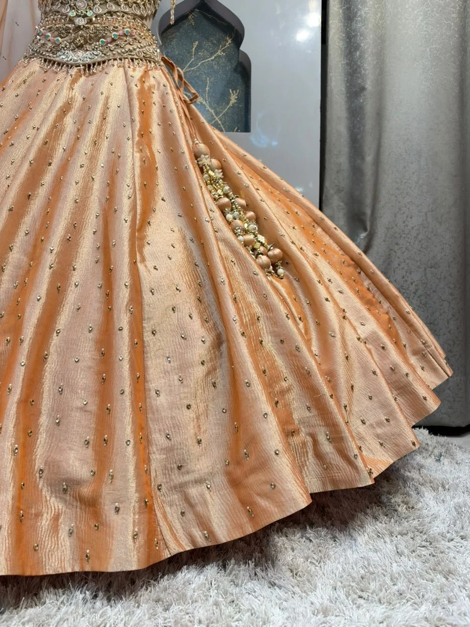 "PEACH PEARL EMBELLISHED ROYAL LEHENGA"