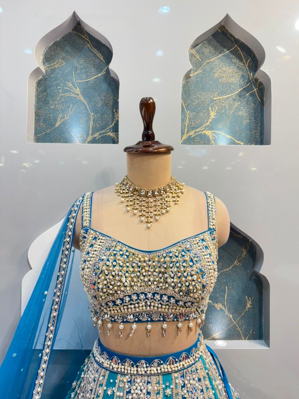 "AQUA BLUE AND SILVER EMBROIDERED LEHENGA"