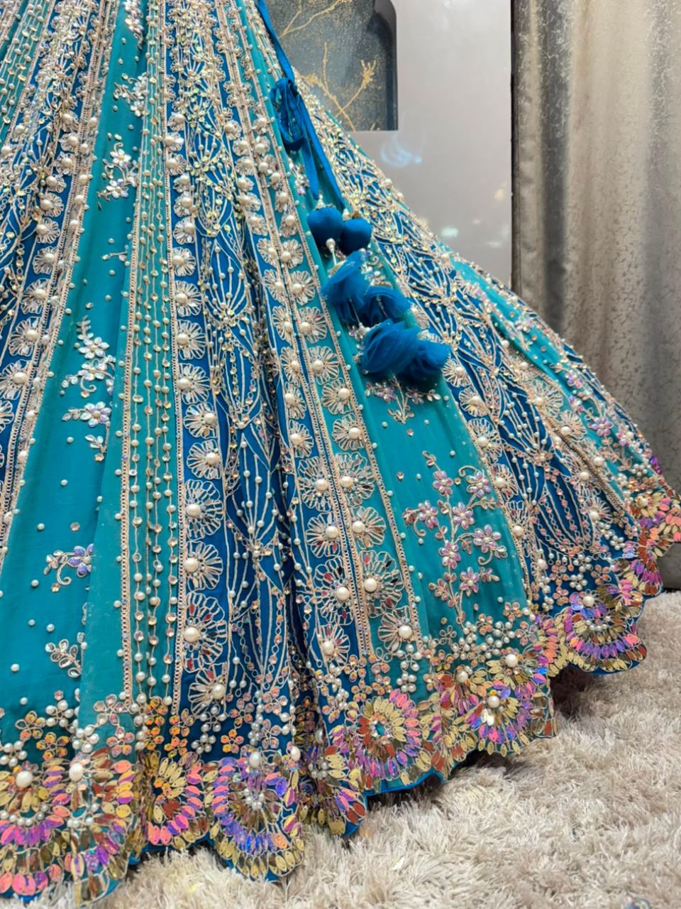 "AQUA BLUE AND SILVER EMBROIDERED LEHENGA"