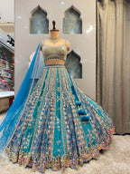 "AQUA BLUE AND SILVER EMBROIDERED LEHENGA"