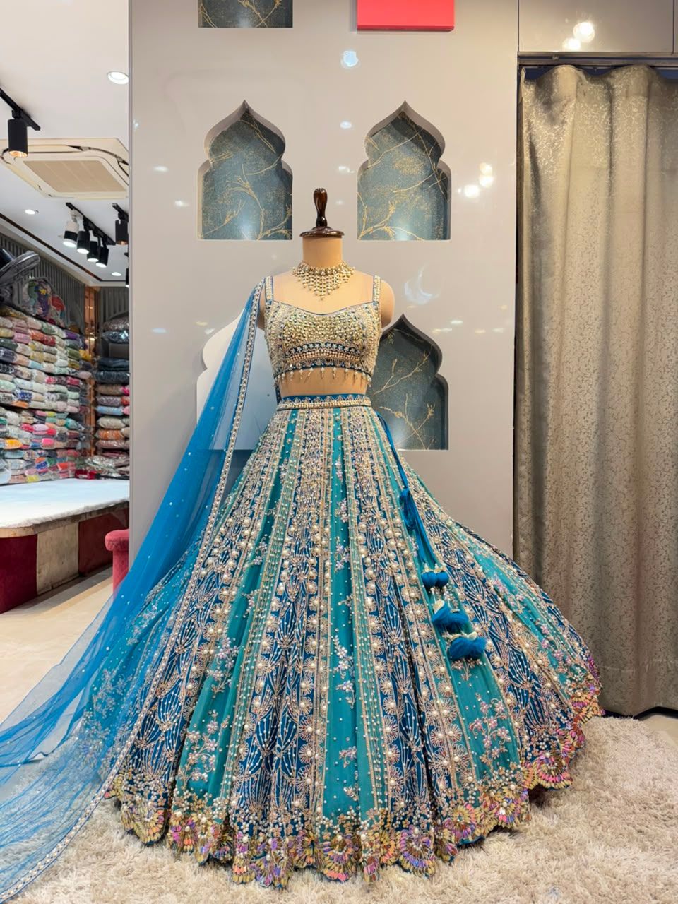 "AQUA BLUE AND SILVER EMBROIDERED LEHENGA"