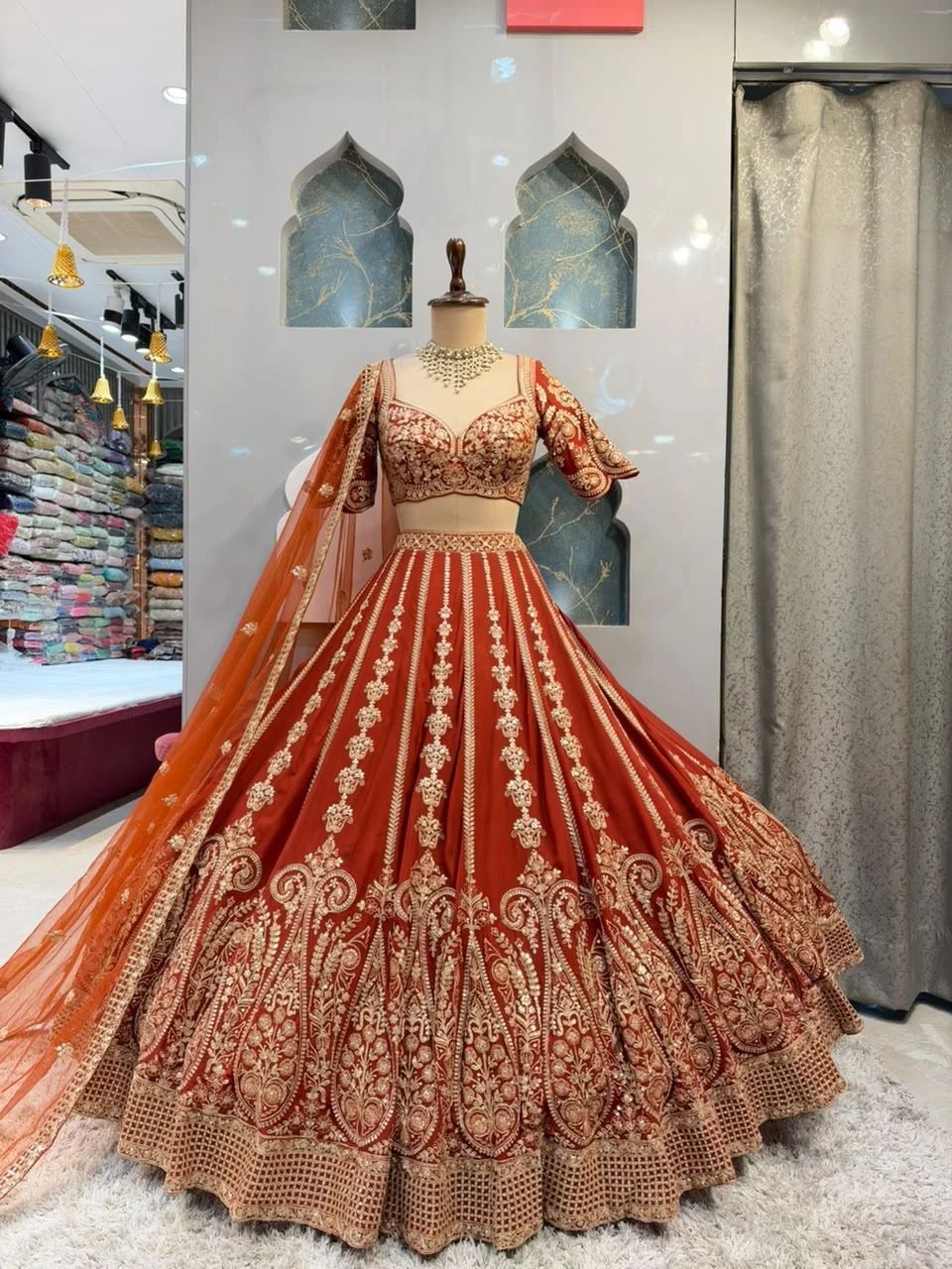 "ROYAL RUST ORANGE LEHENGA WITH ZARI EMBROIDERY"