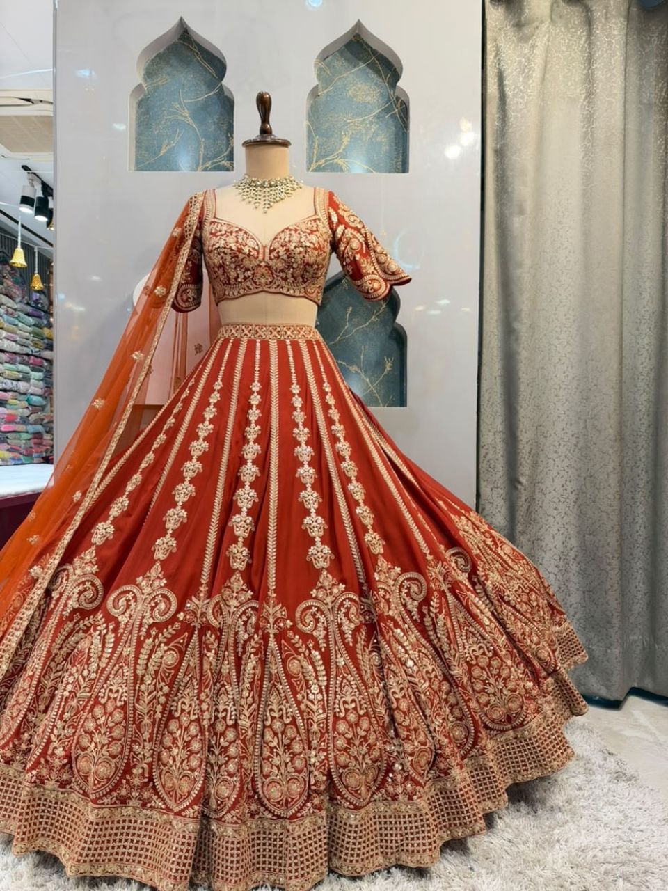 "ROYAL RUST ORANGE LEHENGA WITH ZARI EMBROIDERY"