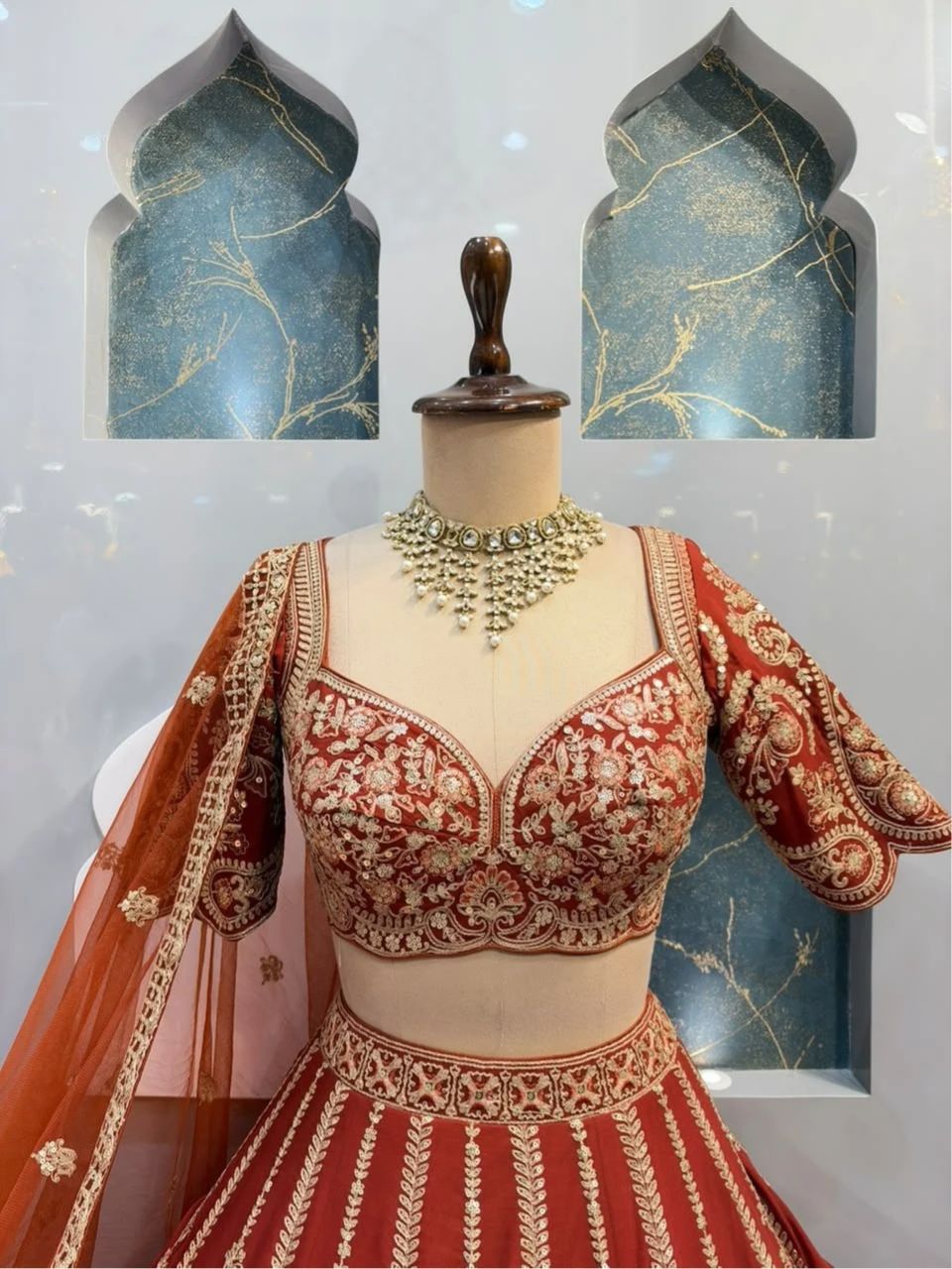 "ROYAL RUST ORANGE LEHENGA WITH ZARI EMBROIDERY"