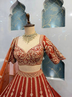 "ROYAL RUST ORANGE LEHENGA WITH ZARI EMBROIDERY"