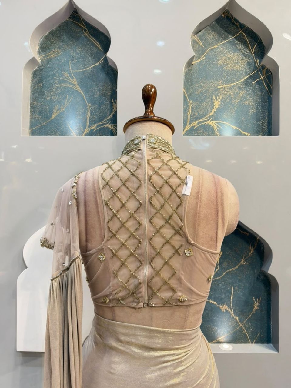 "CHAMPGNE GOLD EMBELLISHED DRAPE SAREE"