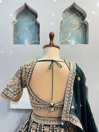 "EMERALD GREEN AND ANTIQUE GOLD EMBROIDERED LEHENGA"