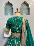 "EMERALD BLOOM HERITAGE LEHENGA"