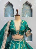 "EMERALD BLOOM HERITAGE LEHENGA"