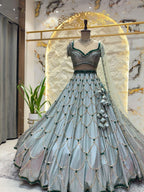 "ICY BLUE & EMERALD GREEN SCAPPLOPED LEHENGA"