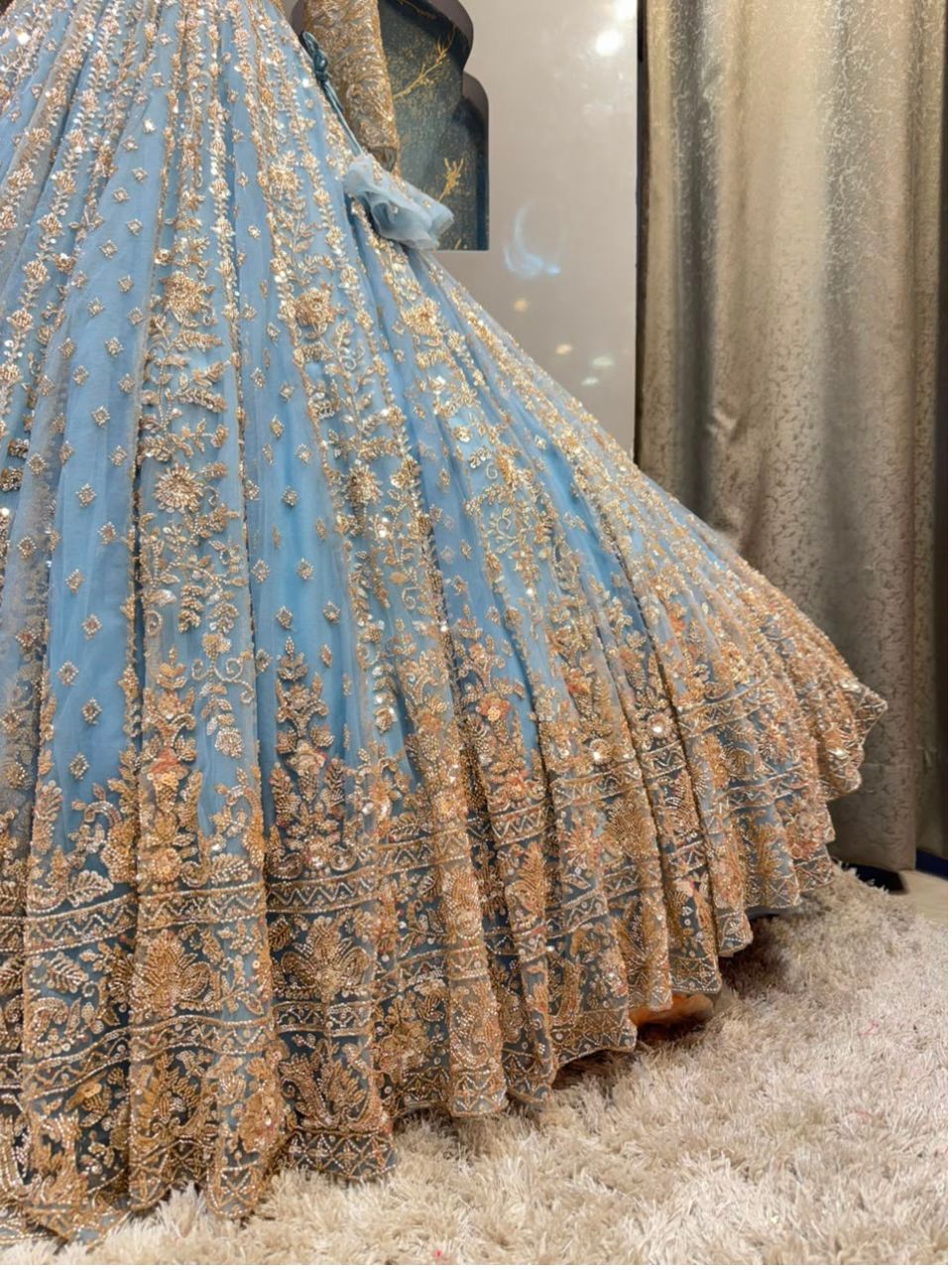 "POWDER BLUE AND GOLD EMBROIDERED LEHENGA"