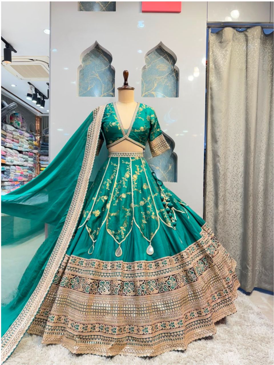 "EMERALD BLOOM HERITAGE LEHENGA"