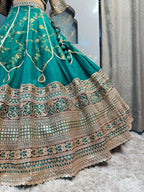 "EMERALD BLOOM HERITAGE LEHENGA"